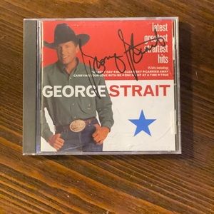 Signed George Strait “latest greatest straitest hits” CD